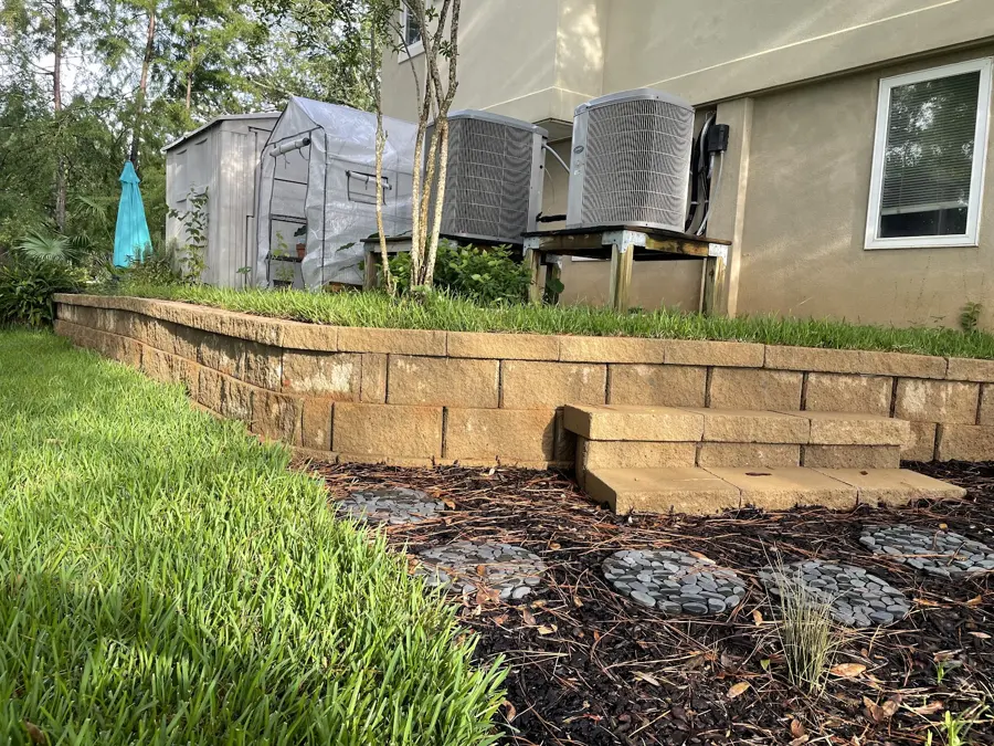 Block retaining wall and new bed